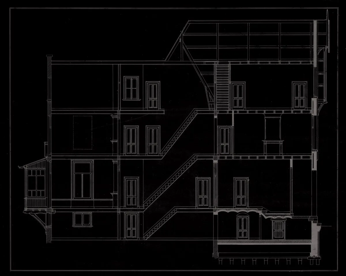 Sectional drawing of a building, drafted in fine white line